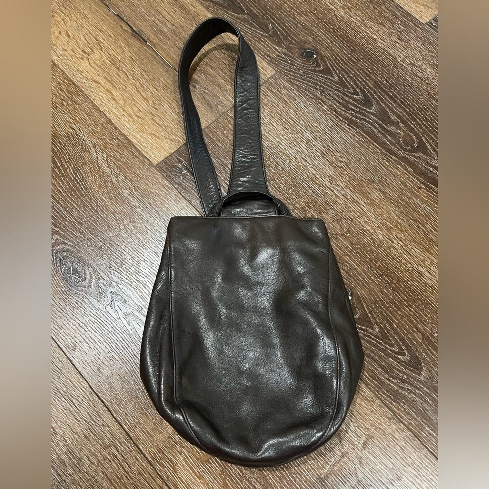 DKNY  sling backpack dark brown color